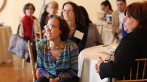 Group of people at a conference table looking in the same direction