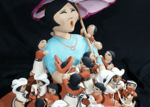 video thumbnail of figurine with umbrella for inspired storytelling presentation video