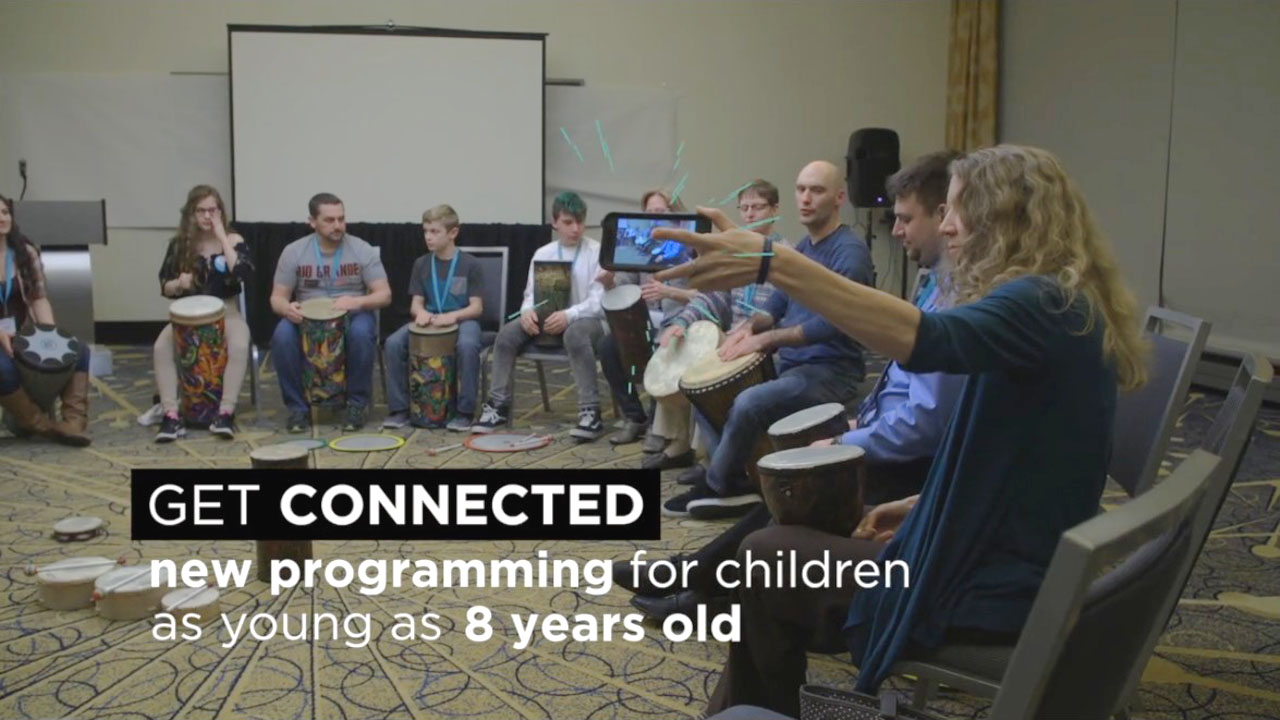 social media video thumbnail of youths teens adults drumming at medical conference