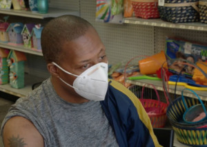 African American COVID-19 vaccination video featuring Black patient getting vaccinated at Flexcare Pharmacy