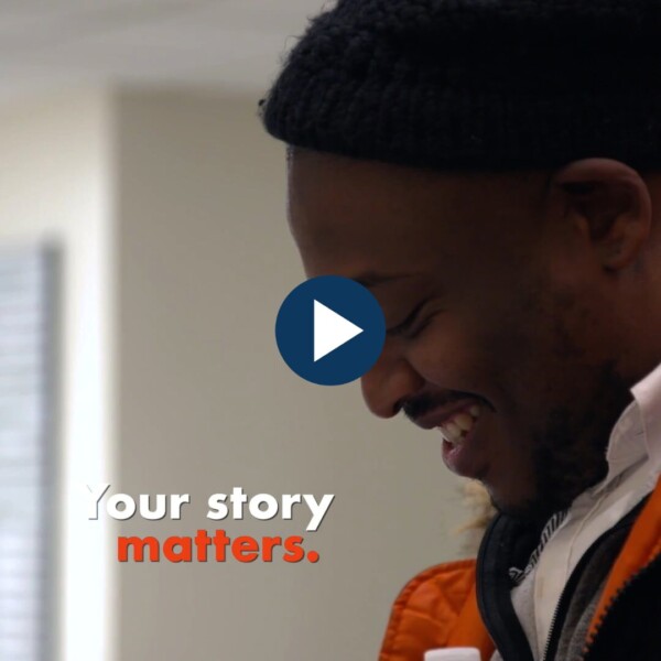 thumbnail for MiniMatters Your Story matters video highlights reel black man smiling with blue play button