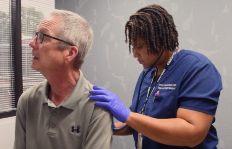 thumbnail of a branding video for the primary care collaborative showing a health care provider listening to a patient's breathing